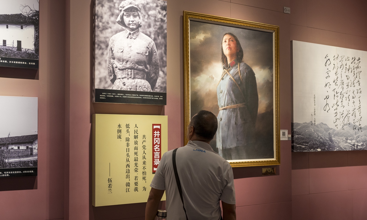 A tourist looks at the collections on display at the Jinggangshan Revolution Museum in East China's Jiangxi Province on July 5, 2026. Photo: VCG