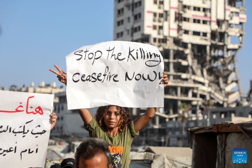 Palestinians take part in a march to protest against Israeli plans for forced displacement in Gaza City, July 23, 2026. (Photo by Rizek Abdeljawad/Xinhua)