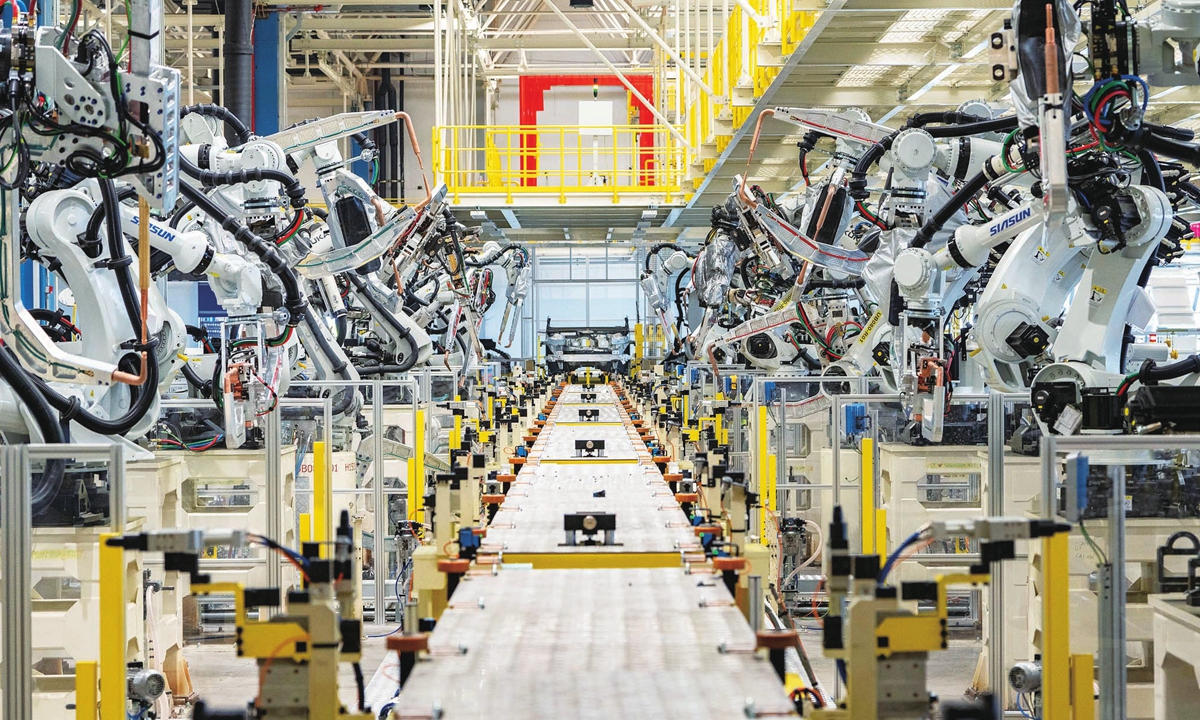 Robots work at the welding assembly line of Geely Auto's Lynk electric vehicle plant in Yiwu city, East China's Zhejiang Province, on February 25, 2026.