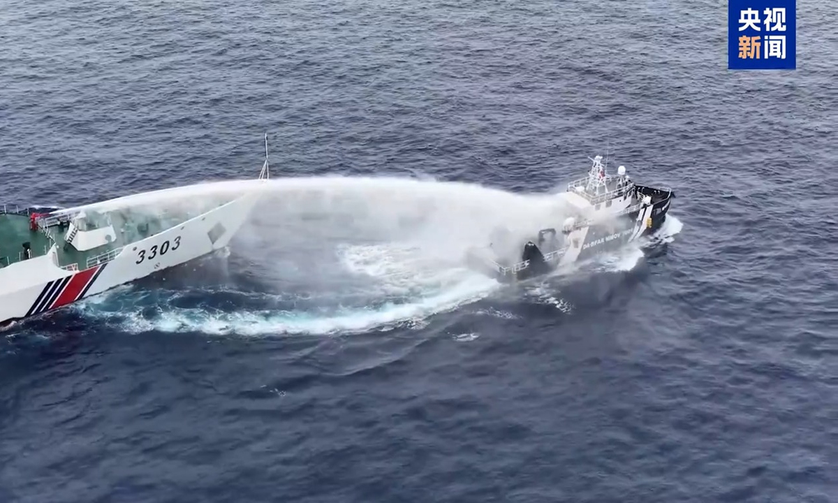 The China Coast Guard takes law enforcement measures against a Philippine vessel involved in illegal activities in waters off Huangyan Dao on July 24, 2026. Photo: CCTV News