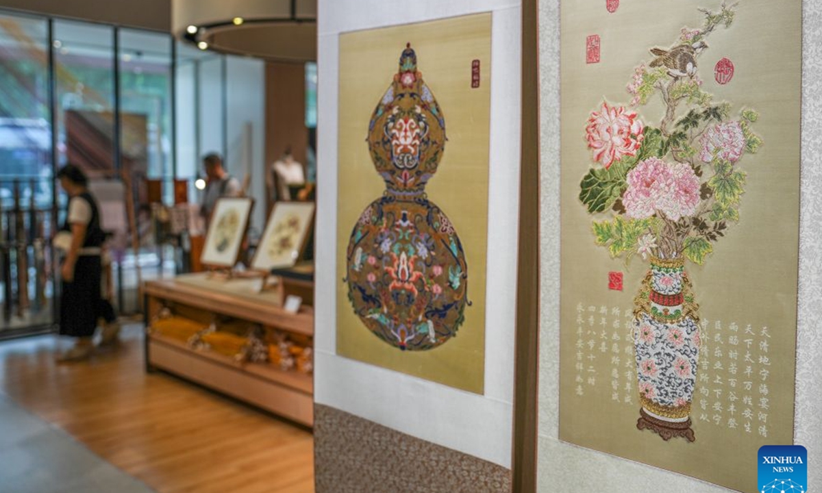 People visit the gift shop at the Nanjing Yunjin Brocade Museum in Nanjing, east China's Jiangsu Province, July 7, 2026. (Xinhua/Li Bo)

