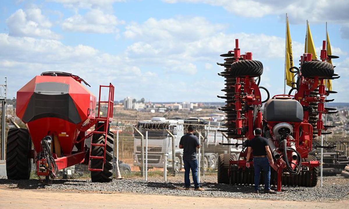 Agricultural machines are displayed at a store in Formosa, Goias, Brazil, July 22, 2026. (Photo by Lucio Tavora/Xinhua)

