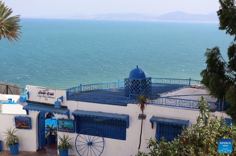 This photo taken on July 25, 2026, shows a view of the Gulf of Tunis seen from the blue and white village of Sidi Bou Said, north of Tunisia. Tunisia's iconic village of Sidi Bou Said has been inscribed on the UNESCO World Heritage List, the country's Ministry of Cultural Affairs said on Saturday. (Photo by Zhou Haojin/Xinhua)
