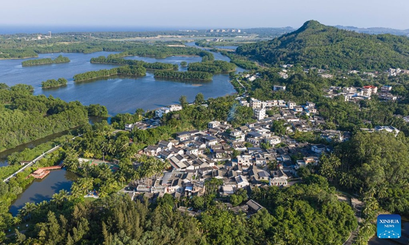 An aerial drone photo taken on July 22, 2026 shows the scenery of Shamei Village in Boao Town, Qionghai City, south China's Hainan Province. Building on the unique identities of Boao Town, home to the Boao Forum for Asia, and Tanmen Town, a historic fishing port with a thousand-year legacy, Qionghai City has been advancing the coordinated construction of picturesque rural villages across the Boao-Tanmen area. Taking advantage of Hainan's round-the-island highway, the city has linked both newly constructed and previously cultivated beautiful and harmonious villages into a cohesive chain to forge a globally influential rural revitalization belt. Photo: Xinhua