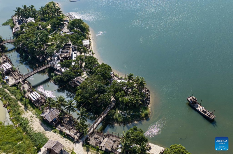 An aerial drone photo taken on July 22, 2026 shows the scenery of Liuke Village in Boao Town, Qionghai City, south China's Hainan Province. Building on the unique identities of Boao Town, home to the Boao Forum for Asia, and Tanmen Town, a historic fishing port with a thousand-year legacy, Qionghai City has been advancing the coordinated construction of picturesque rural villages across the Boao-Tanmen area. Taking advantage of Hainan's round-the-island highway, the city has linked both newly constructed and previously cultivated beautiful and harmonious villages into a cohesive chain to forge a globally influential rural revitalization belt. Photo: Xinhua
