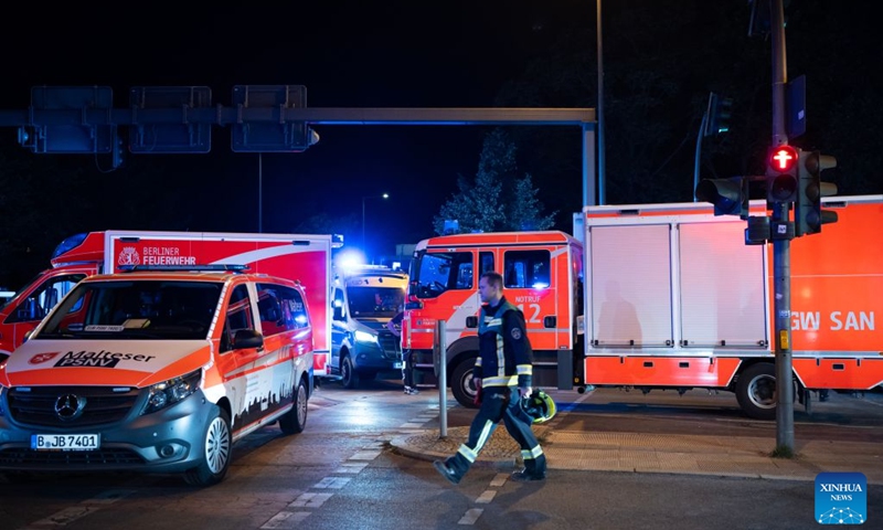 A rescuer works near the site where a car drove into a crowd in Berlin, Germany, July 26, 2026. One person was killed and 16 others were injured, including several with life-threatening injuries, after a car drove into a crowd at a large Pride celebration in central Berlin on Saturday evening, a police spokesperson said. (Xinhua/Zhang Haofu)