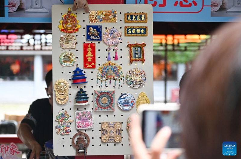 Cultural and creative products themed on the Temple of Heaven and other elements are pictured in Beijing, capital of China, July 24, 2026. Marking the second anniversary of the successful inscription of the Beijing Central Axis on the UNESCO World Heritage List, heritage sites along the Beijing Central Axis, such as the Palace Museum, Zhengyangmen Gate, and Altar of the God of Agriculture, also referred to as the Xiannongtan Temple, will either open to the public free of charge or launch new exhibitions on July 27.
Over the past two years, efforts to conserve, inherit and make good use of the Beijing Central Axis have advanced steadily, achieving new outcomes in areas including related legal system, UNESCO World Heritage signage, landscape improvement, creative utilization, collaborative protection and international communication. Photo: Xinhua