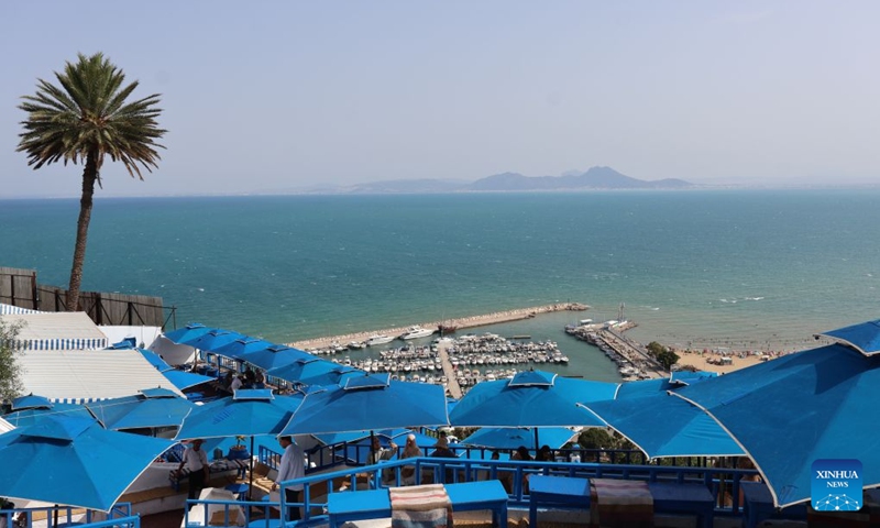 This photo taken on July 25, 2026, shows a view of the Gulf of Tunis seen from the blue and white village of Sidi Bou Said, north of Tunisia. Tunisia's iconic village of Sidi Bou Said has been inscribed on the UNESCO World Heritage List, the country's Ministry of Cultural Affairs said on Saturday. (Xinhua/Zhou Haojin)