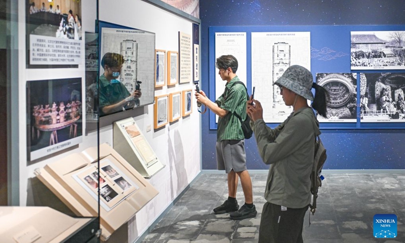 Journalists visit an exhibition, scheduled to open on July 27, during a press preview at Beijing Ancient Architecture Museum inside the Altar of the God of Agriculture, also referred to as the Xiannongtan Temple, in Beijing, capital of China, July 24, 2026. Marking the second anniversary of the successful inscription of the Beijing Central Axis on the UNESCO World Heritage List, heritage sites along the Beijing Central Axis, such as the Palace Museum, Zhengyangmen Gate, and Altar of the God of Agriculture, also referred to as the Xiannongtan Temple, will either open to the public free of charge or launch new exhibitions on July 27.
Over the past two years, efforts to conserve, inherit and make good use of the Beijing Central Axis have advanced steadily, achieving new outcomes in areas including related legal system, UNESCO World Heritage signage, landscape improvement, creative utilization, collaborative protection and international communication. Photo: Xinhua