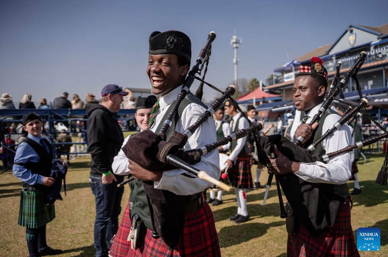Members of a pipe band perform during the SA Pipe Band Championships in Bedfordview, South Africa, July 25, 2026. (Photo by Ihsaan Haffejee/Xinhua)