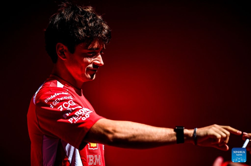 Ferrari's Charles Leclerc of Monaco arrives at the paddock before the third free practice session of the Formula One Hungarian Grand Prix at the Hungaroring in Mogyorod, near Budapest, Hungary, July 25, 2026. (Photo by David Balogh/Xinhua)