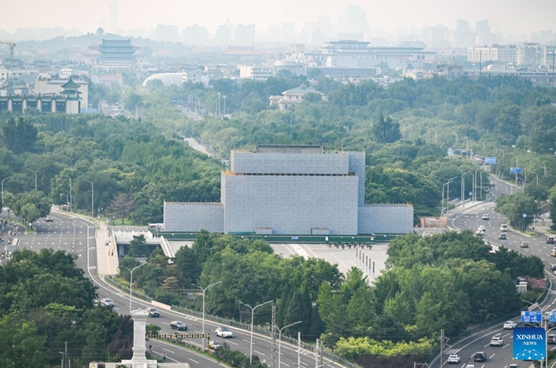 This photo taken on July 24, 2026 shows a view of the Yongdingmen Gate under renovation in Beijing, capital of China. The systemic renovation of the Yongdingmen Gate started on October 2025. Marking the second anniversary of the successful inscription of the Beijing Central Axis on the UNESCO World Heritage List, heritage sites along the Beijing Central Axis, such as the Palace Museum, Zhengyangmen Gate, and Altar of the God of Agriculture, also referred to as the Xiannongtan Temple, will either open to the public free of charge or launch new exhibitions on July 27.
Over the past two years, efforts to conserve, inherit and make good use of the Beijing Central Axis have advanced steadily, achieving new outcomes in areas including related legal system, UNESCO World Heritage signage, landscape improvement, creative utilization, collaborative protection and international communication. Photo: Xinhua