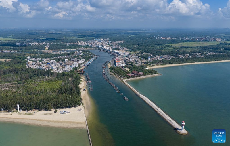 An aerial drone photo taken on July 24, 2026 shows the Paigang Village and Tanmen fishing port in Tanmen Town, Qionghai City, south China's Hainan Province. Building on the unique identities of Boao Town, home to the Boao Forum for Asia, and Tanmen Town, a historic fishing port with a thousand-year legacy, Qionghai City has been advancing the coordinated construction of picturesque rural villages across the Boao-Tanmen area. Taking advantage of Hainan's round-the-island highway, the city has linked both newly constructed and previously cultivated beautiful and harmonious villages into a cohesive chain to forge a globally influential rural revitalization belt. Photo: Xinhua