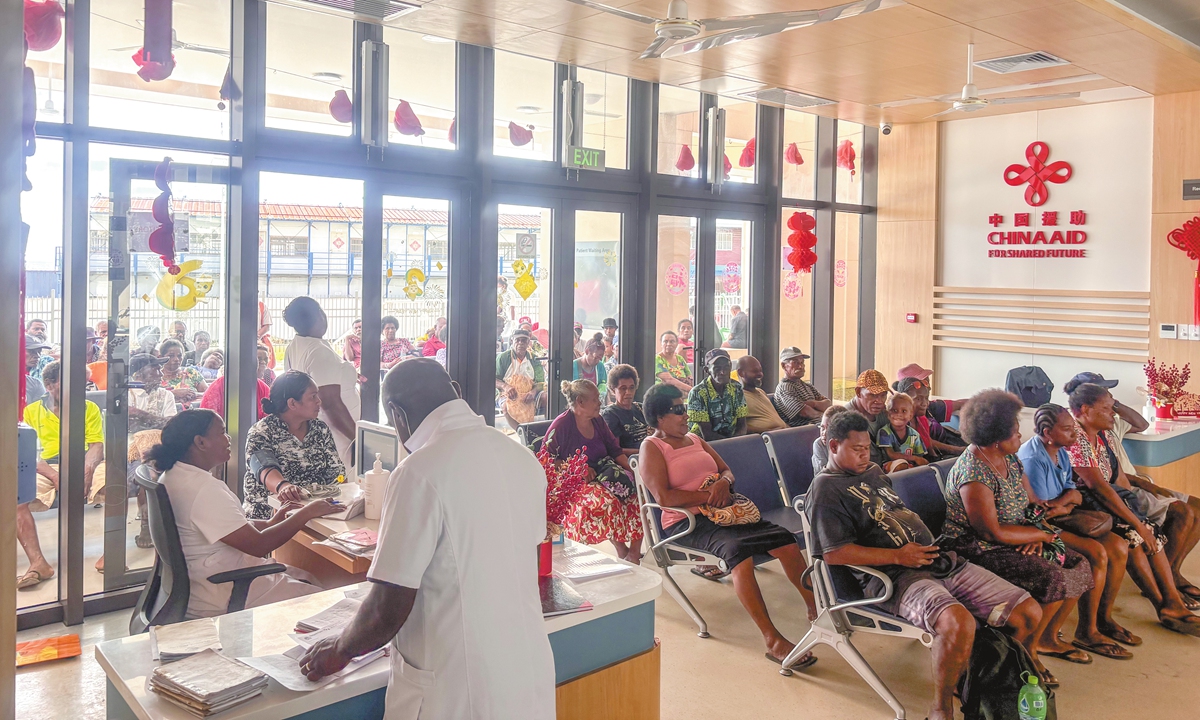 Visitors wait in the waiting area in the National Referral Hospital Comprehensive Medical Center in Honiara, Solomon Islands.