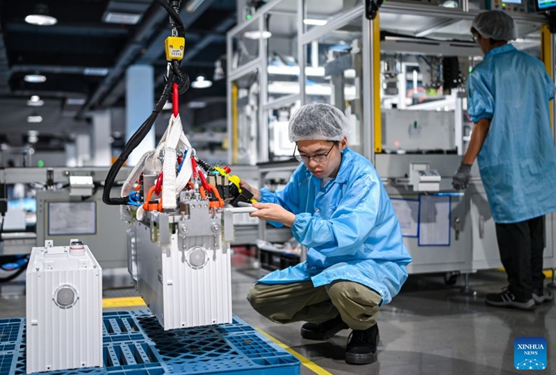 Staff members work in an energy storage production workshop at the Sigenergy Nantong Smart Energy Center in Nantong, east China's Jiangsu Province, July 24, 2026. Unlike traditional factories, Sigenergy has achieved a leap from single-point automation to full-process collaborative intelligence. Every key piece of equipment here is connected to the industrial internet, realizing the practical integration of AI plus energy.
Sigenergy is one of the Chinese new energy enterprises who are adhering to technological innovation and actively reshaping the new pattern of intelligent manufacturing. Photo: Xinhua