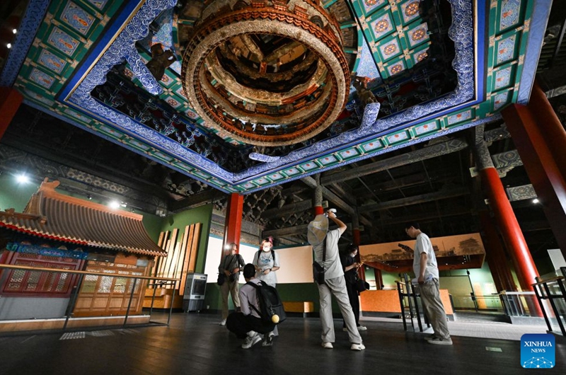 People visit the Beijing Ancient Architecture Museum inside the Altar of the God of Agriculture, also referred to as the Xiannongtan Temple, in Beijing, capital of China, July 24, 2026. Marking the second anniversary of the successful inscription of the Beijing Central Axis on the UNESCO World Heritage List, heritage sites along the Beijing Central Axis, such as the Palace Museum, Zhengyangmen Gate, and Altar of the God of Agriculture, also referred to as the Xiannongtan Temple, will either open to the public free of charge or launch new exhibitions on July 27.
Over the past two years, efforts to conserve, inherit and make good use of the Beijing Central Axis have advanced steadily, achieving new outcomes in areas including related legal system, UNESCO World Heritage signage, landscape improvement, creative utilization, collaborative protection and international communication. Photo: Xinhua
