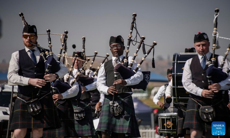 Members of a pipe band perform during the SA Pipe Band Championships in Bedfordview, South Africa, July 25, 2026. (Photo by Ihsaan Haffejee/Xinhua)