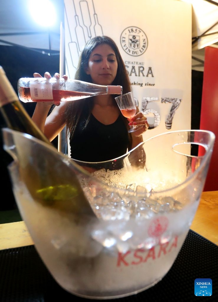 A woman attends a wine festival held in Dhour Choueir, Lebanon, on July 25, 2026. (Xinhua/Bilal Jawich)