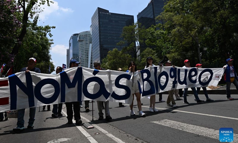 Protesters march during a demonstration in support of Cuba and against U.S. embargo on Cuba, in Mexico City, Mexico on July 26, 2026. The demonstration aimed to commemorate the 73rd anniversary of the assault on Moncada and Carlos Manuel de Cespedes garrisons that took place on July 26, 1953, seen as the beginning of the Cuban Revolution. (Xinhua/Wu Wei)