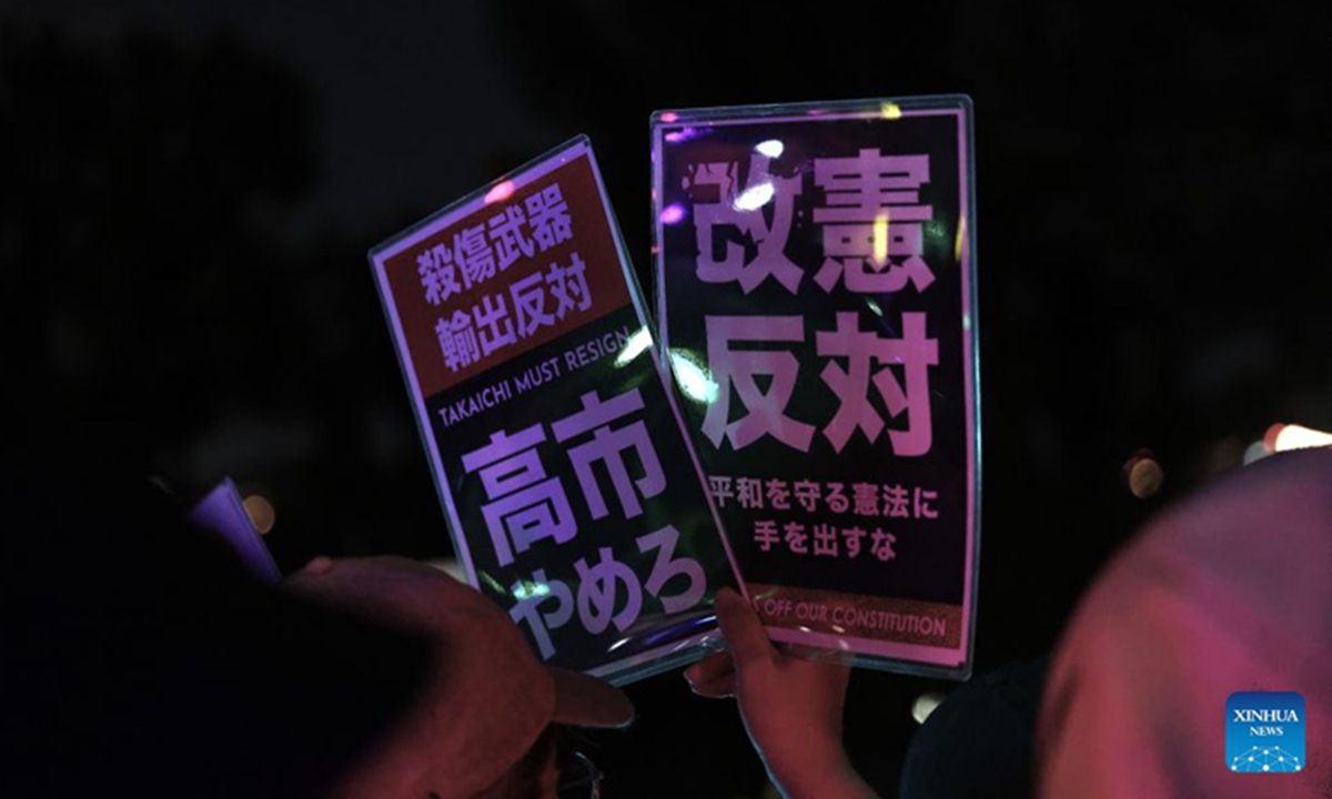 People holding signs attend a protest rally in front of the National Diet Building in Tokyo, Japan, July 10, 2026. A large number of Japanese citizens gathered in front of the National Diet Building in Tokyo on Friday evening to protest a series of dangerous policies and bills recently promoted by the government of Prime Minister Sanae Takaichi. Photo: Xinhua