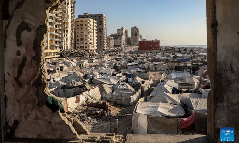 This photo taken on July 25, 2026 shows tents of displaced Palestinians in Gaza City. (Photo by Rizek Abdeljawad/Xinhua)