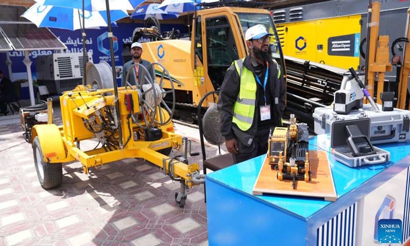 An exhibitor showcases products during a telecommunications and technology exposition in Kabul, Afghanistan, July 26, 2026.(Photo by Saifurahman Safi/Xinhia)

