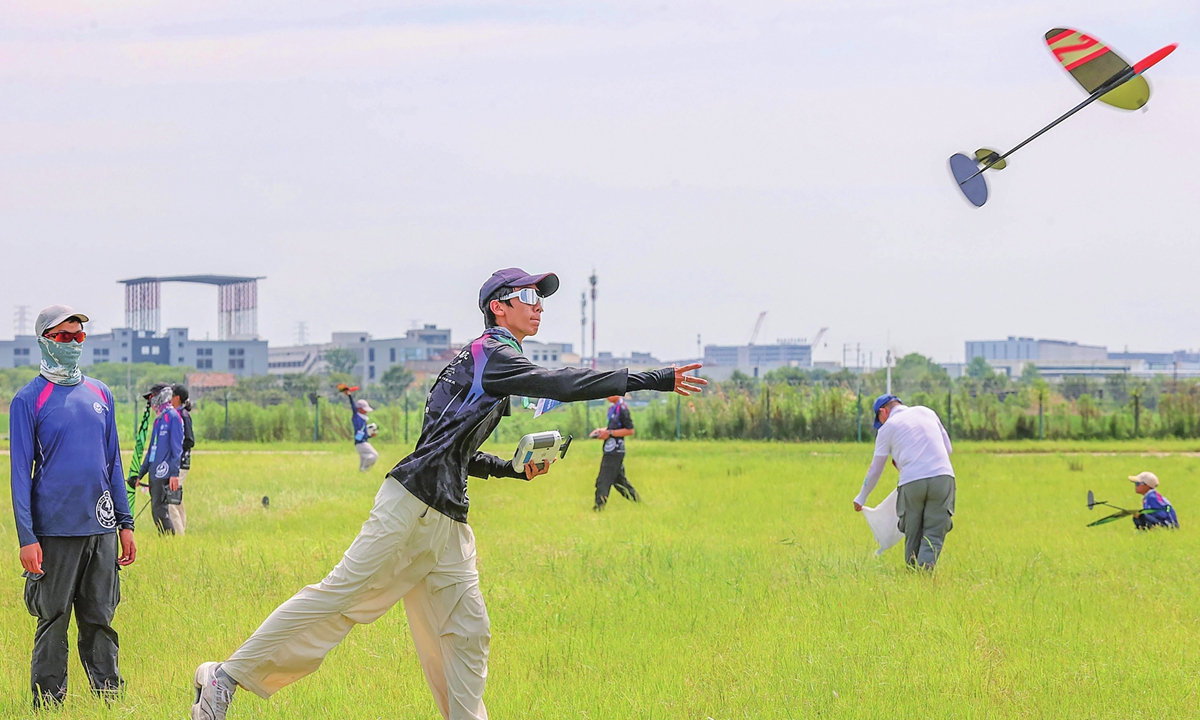 A contestant flies a self-designed aircraft during a competition at an airport  in Deqing, East China's Zhejiang Province on July 27, 2026. The event is part of the China youth aircraft design innovation competition finals, which saw more than 1,000 young participants from across China take part. Photo: VCG