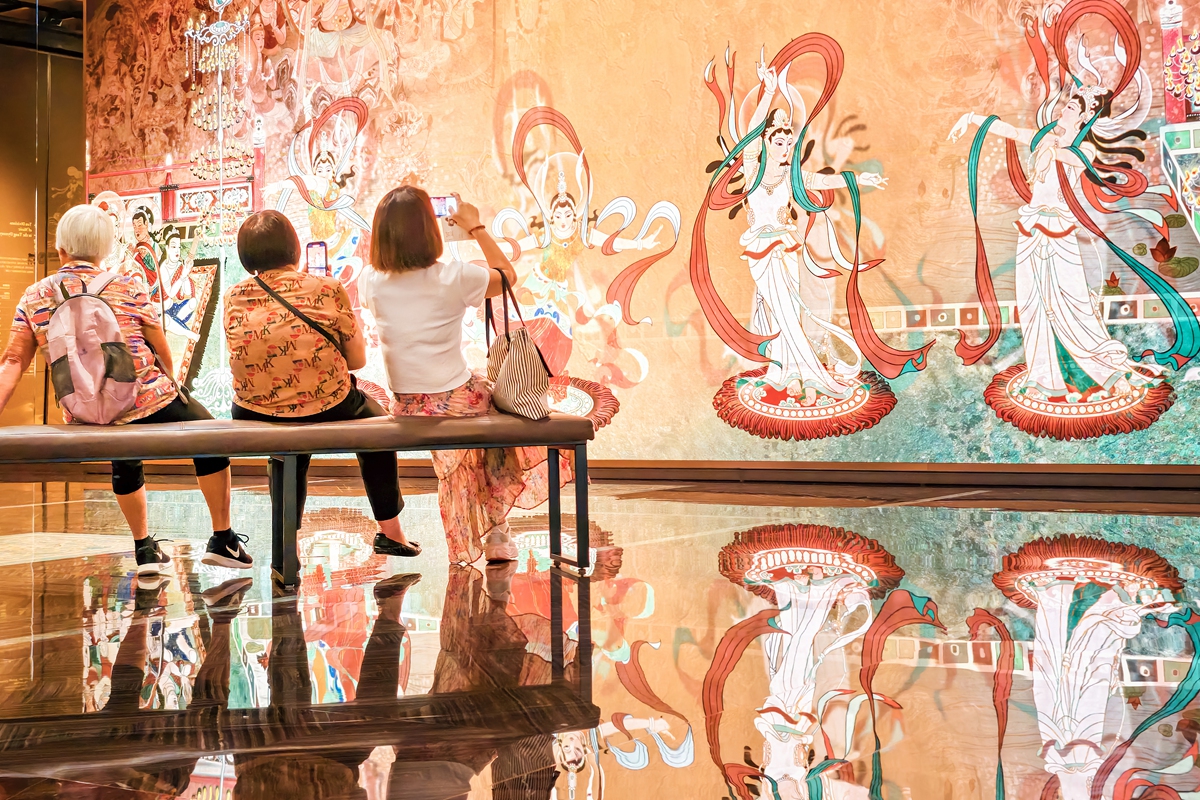 Visitors explore the Silk Roads Beyond Borders exhibition in the Macao Special Administrative Region on July 27, 2026. Featuring an array of historical relics and artistic treasures, the exhibition aims to deepen cultural identity and advance exchanges and mutual learning between Chinese and foreign civilizations. Photo: VCG