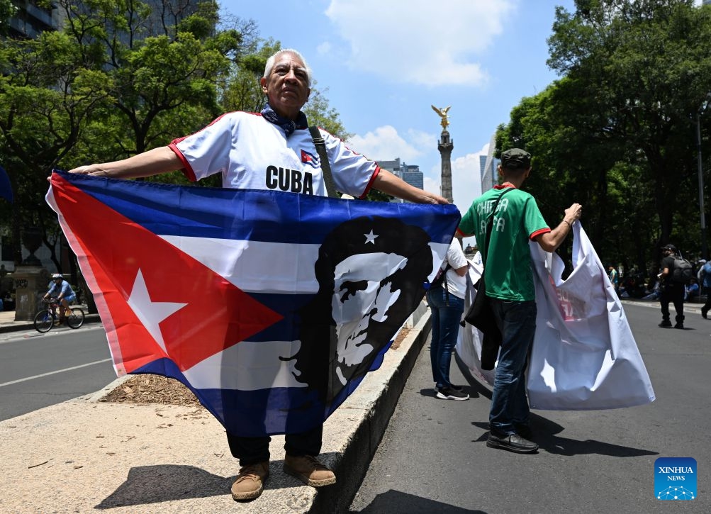 Protesters march during a demonstration in support of Cuba and against U.S. embargo on Cuba, in Mexico City, Mexico on July 26, 2026. The demonstration aimed to commemorate the 73rd anniversary of the assault on Moncada and Carlos Manuel de Cespedes garrisons that took place on July 26, 1953, seen as the beginning of the Cuban Revolution. (Xinhua/Wu Wei)