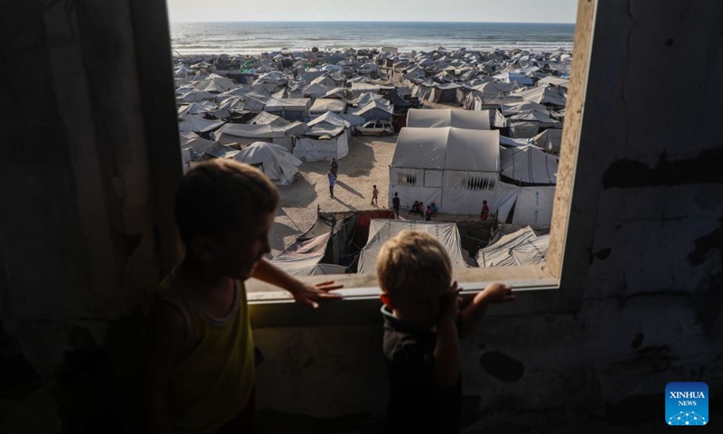 This photo taken on July 25, 2026 shows tents of displaced Palestinians in Gaza City. (Photo by Rizek Abdeljawad/Xinhua)