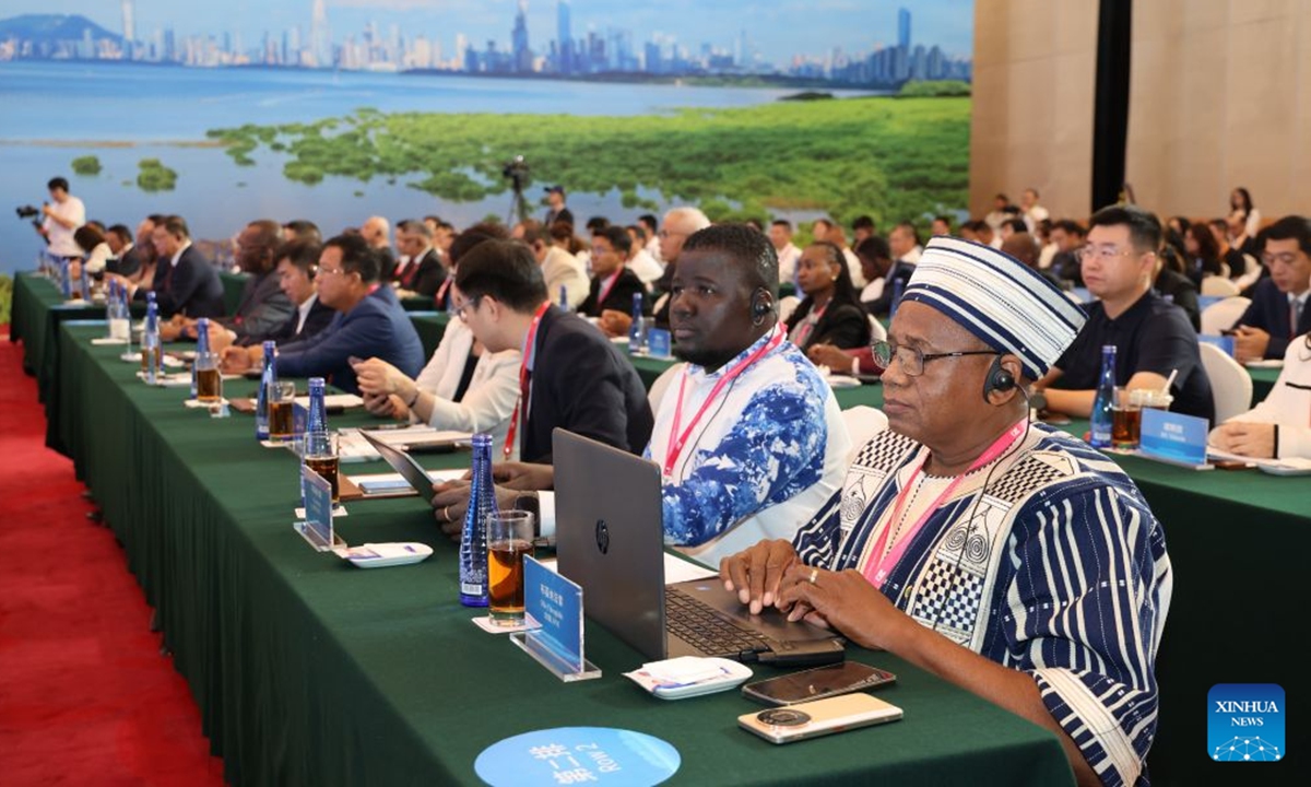 Representatives attend the opening ceremony of the first council meeting of the International Mangrove Center in Shenzhen, south China's Guangdong Province, July 26, 2026.