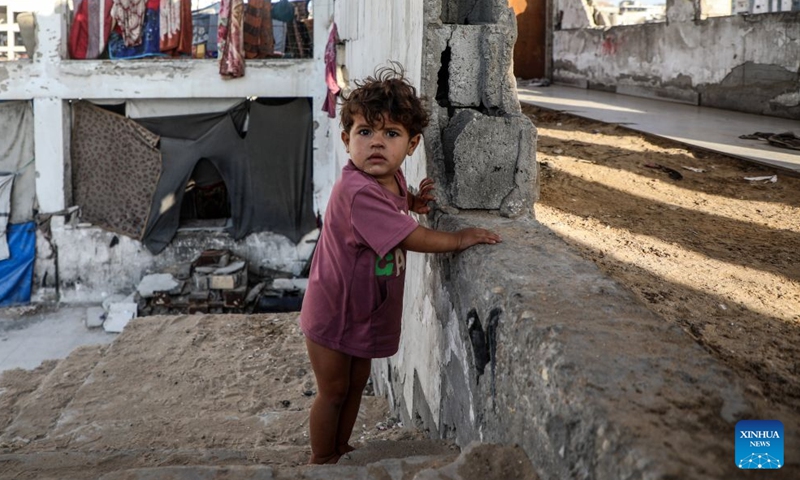 This photo taken on July 25, 2026 shows a displaced Palestinian child in Gaza City. (Photo by Rizek Abdeljawad/Xinhua)