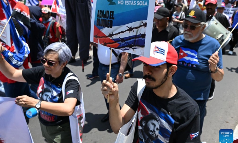 Protesters march during a demonstration in support of Cuba and against U.S. embargo on Cuba, in Mexico City, Mexico on July 26, 2026. The demonstration aimed to commemorate the 73rd anniversary of the assault on Moncada and Carlos Manuel de Cespedes garrisons that took place on July 26, 1953, seen as the beginning of the Cuban Revolution. (Xinhua/Wu Wei)