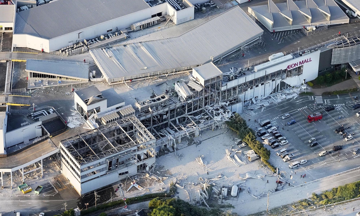 Photo taken from a Kyodo News helicopter on July 28, 2026, shows a partially destroyed Aeon Mall building in Kashima, Kumamoto Prefecture, following reports of an explosion after an earthquake with a preliminary magnitude of 7.1 shook the southwestern Japan prefecture. Photo: VCG
