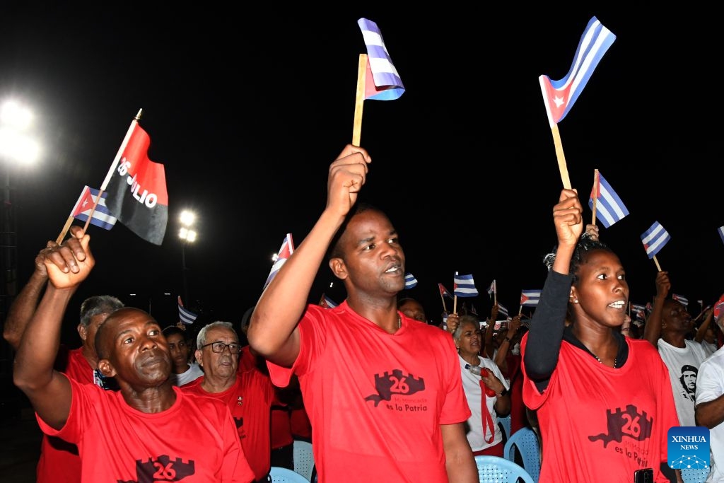 People attend a ceremony marking the 73rd anniversary of the National Rebellion Day in Pinar del Rio, Cuba, July 26, 2026. The National Rebellion Day marks events on July 26, 1953, when late revolutionary leader Fidel Castro and about 100 of his followers attempted to take the Moncada Barracks, the second military fortress of the Fulgencio Batista's dictatorship, in the city of Santiago de Cuba, and the Carlos Manuel de Cespedes Barracks in the nearby town of Bayamo. (Photo by Joaquin Hernandez/Xinhua)

