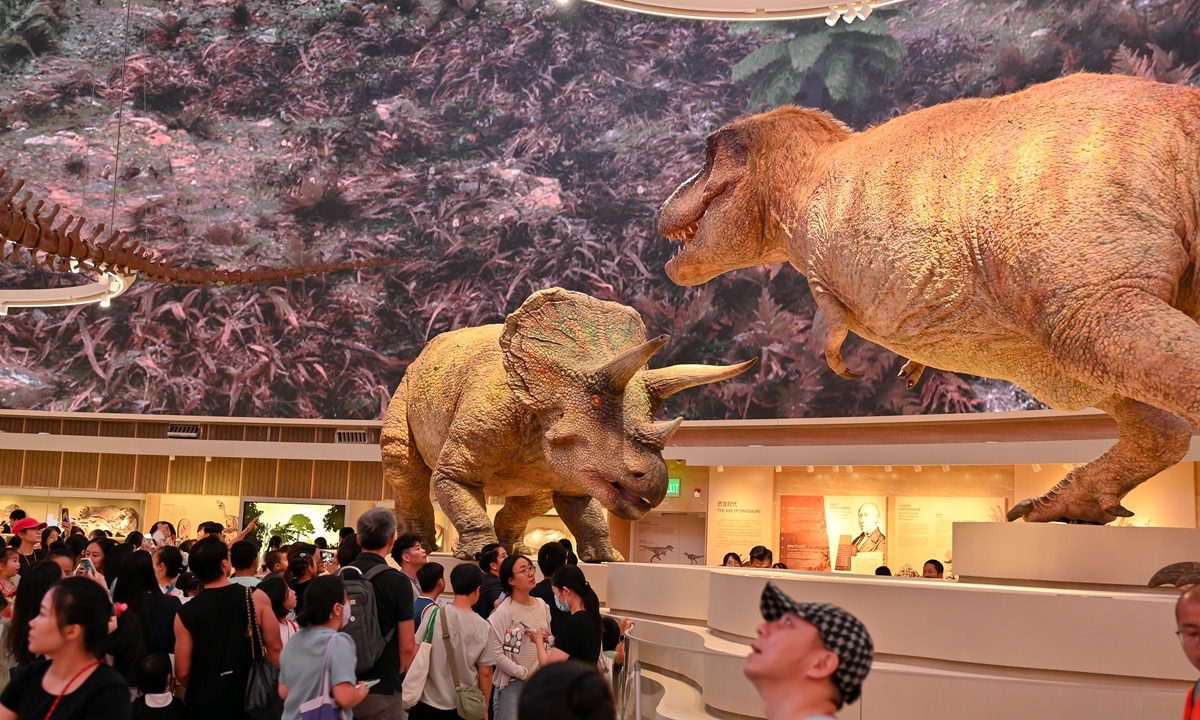 Visitors explore the Dinosaur Hall at the Shenzhen Natural History Museum in Shenzhen, South China's Guangdong Province, on July 28, 2026. Photo: VCG