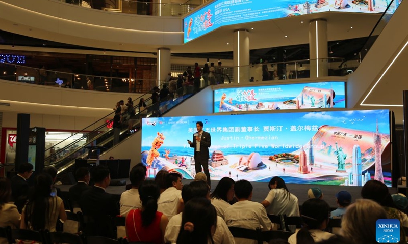 Justin Ghermezian, vice chairman of Triple Five Worldwide Group, developer of American Dream, speaks at an event to promote tourism for Guangdong-Hong Kong-Macao Greater Bay Area, in East Rutherford, New Jersey, the United States, on July 26, 2026. South China's Guangdong province on Sunday showcased its vast cultural and tourism resources in the United States, inviting American visitors to experience the region's diverse attractions.(Xinhua/Liu Yanan)

