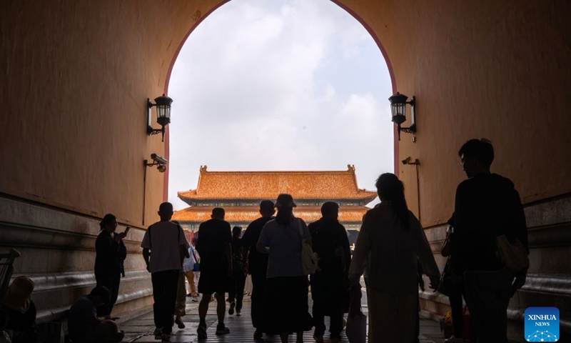 People visit the Palace Museum in Beijing, capital of China, July 27, 2026. The Palace Museum opened to the public free of charge on Monday to mark the second anniversary of the successful inscription of the Beijing Central Axis on the UNESCO World Heritage List. (Xinhua/Jin Liangkuai)

