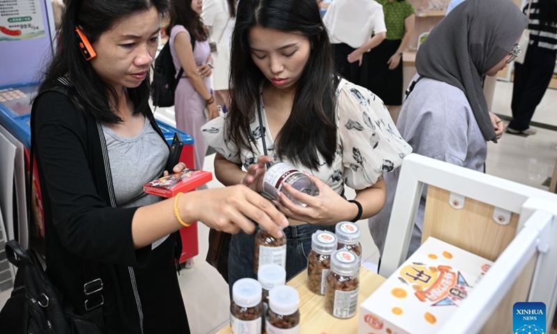 Journalists and social media influencers from ASEAN countries learn about local agricultural products in Qingyuan, south China's Guangdong Province, July 27, 2026.

