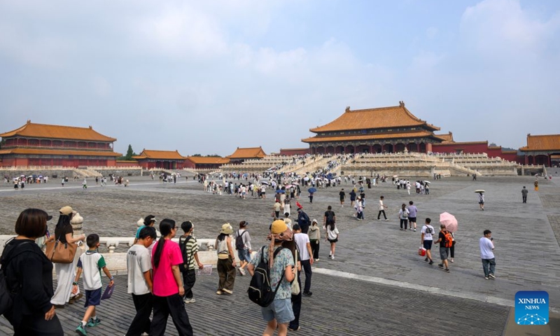 People visit the Palace Museum in Beijing, capital of China, July 27, 2026. The Palace Museum opened to the public free of charge on Monday to mark the second anniversary of the successful inscription of the Beijing Central Axis on the UNESCO World Heritage List. (Xinhua/Jin Liangkuai)

