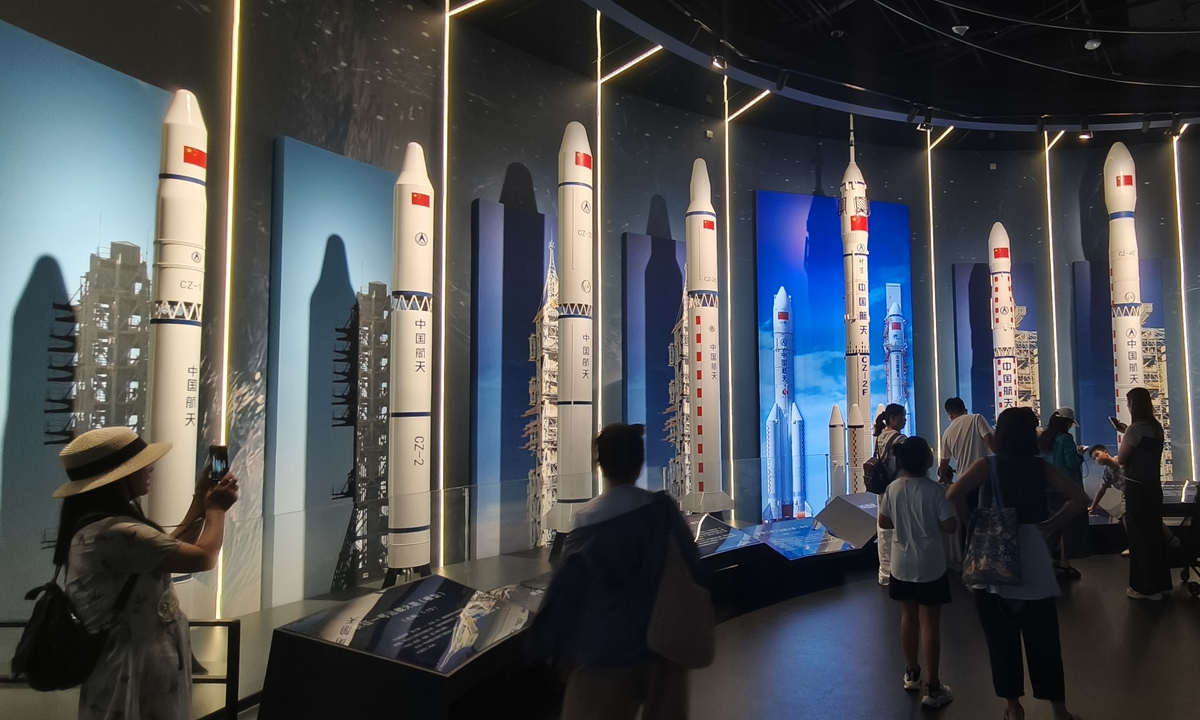 Visitors tour the 