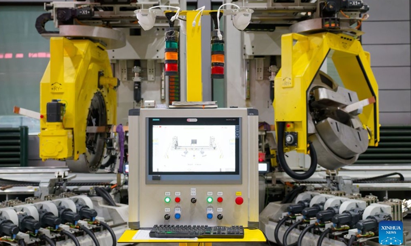 This photo taken on July 28, 2026 shows an intelligent manufacturing equipment working at a workshop of Harbin Electric Machinery Co., Ltd. in Harbin, northeast China's Heilongjiang Province.(Xinhua/Zhang Tao)