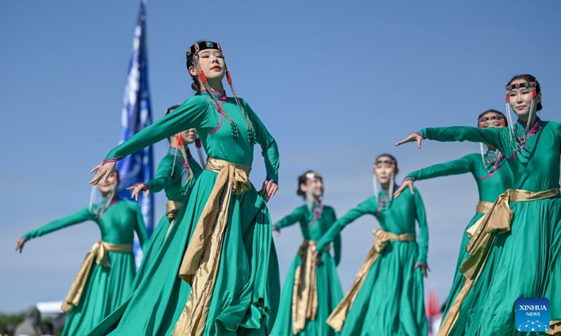 Actors give a performance during the opening of a starry grassland tourism season in Xilingol League, north China's Inner Mongolia Autonomous Region, Aug. 1, 2026. A starry grassland tourism season kicked off here on Saturday, featuring nine themed events including starry-sky photography exhibitions and regular stargazing experience sessions. (Xinhua/Lian Zhen)