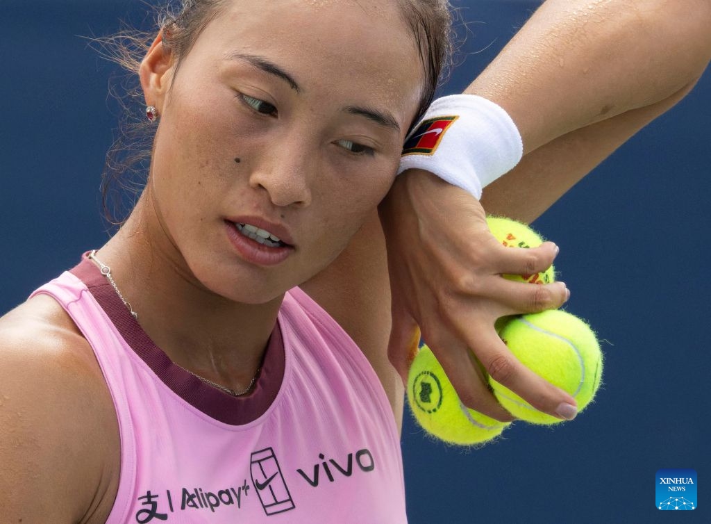 Zheng Qinwen of China reacts during the women's singles qualifying match between Lanlana Tararudee of Thailand and Zheng Qinwen of China at the 2026 National Bank Open tennis tournament in Toronto, Canada, on Aug. 1, 2026. (Photo by Zou Zheng/Xinhua)