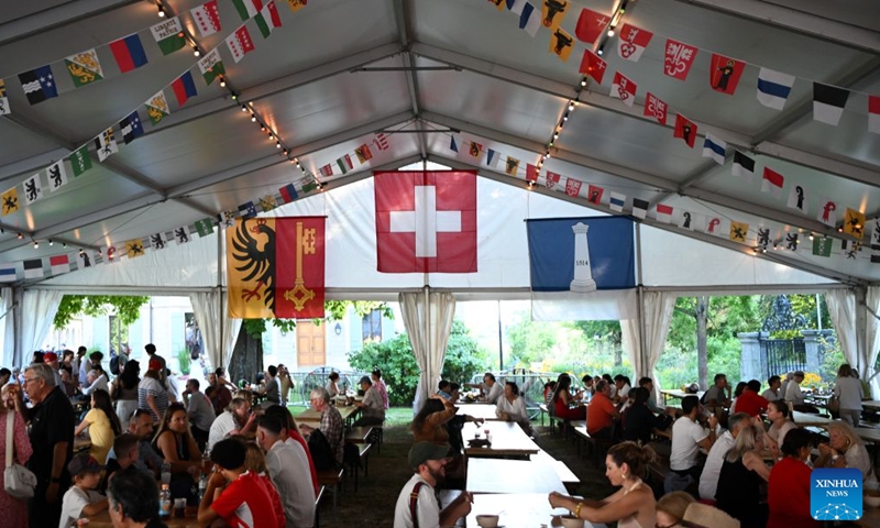 People attend an event to celebrate the Swiss National Day in Geneva, Switzerland, Aug. 1, 2026. (Xinhua/Lian Yi)
