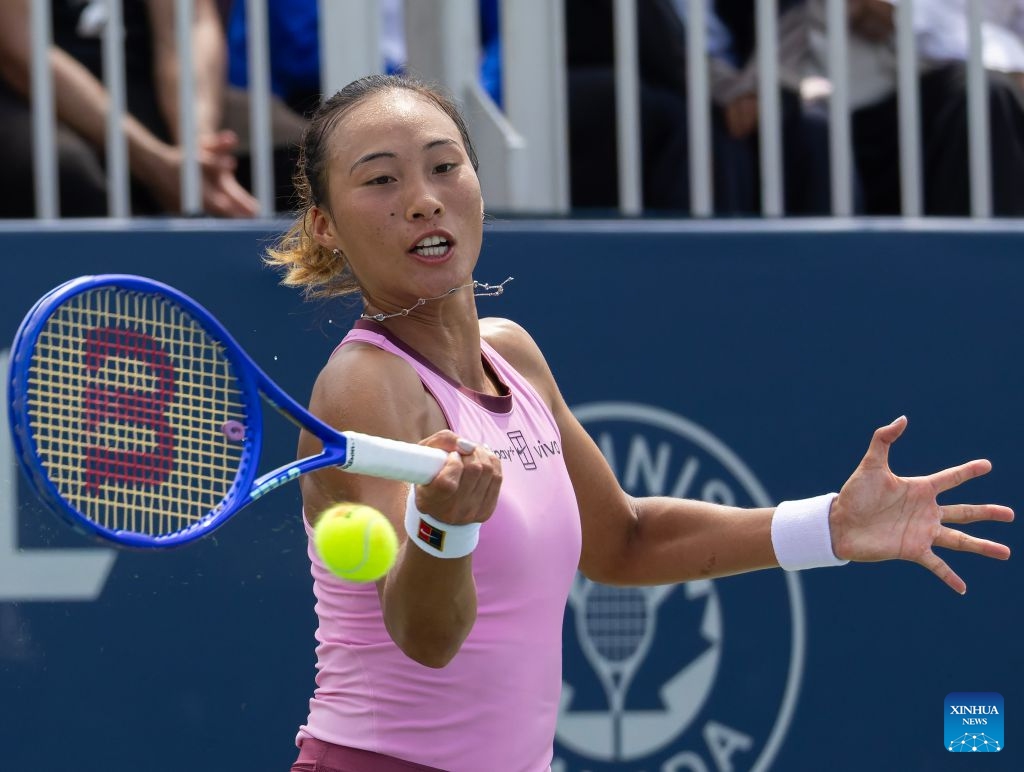 Zheng Qinwen of China returns the ball during the women's singles qualifying match between Lanlana Tararudee of Thailand and Zheng Qinwen of China at the 2026 National Bank Open tennis tournament in Toronto, Canada, on Aug. 1, 2026. (Photo by Zou Zheng/Xinhua)
