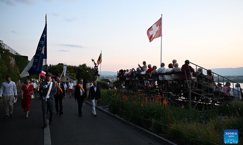 People attend an event to celebrate the Swiss National Day in Geneva, Switzerland, Aug. 1, 2026. (Xinhua/Lian Yi)