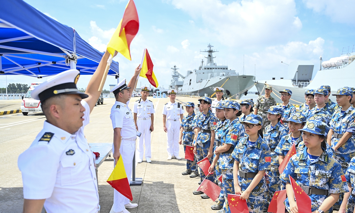 Hong Kong and Macao youths learn about naval flag signaling at an open camp activity at the Chinese People's Liberation Army (PLA) Navy base in Zhanjiang, South China's Guangdong Province on August 3, 2026. Photo: VCG