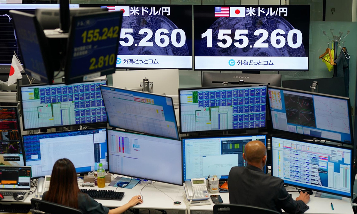 An electronic board displays the Japanese yen's exchange rate against the U.S. dollar in Minato Ward, Tokyo, Japan, on August 3, 2026. Photo: VCG