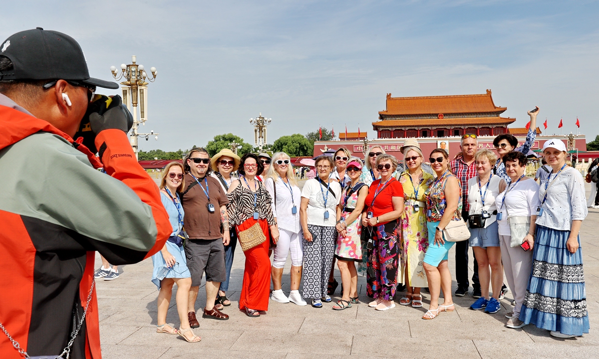 Foreign tourists visit Tiananmen Square in Beijing on September 26, 2025. Photo: VCG